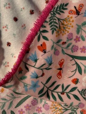 Baby blanket new with soft double sided velvet fabric.